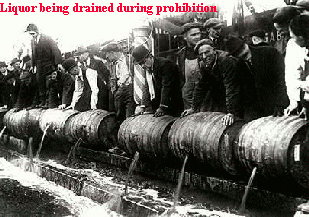 Liquor being drained during prohibition